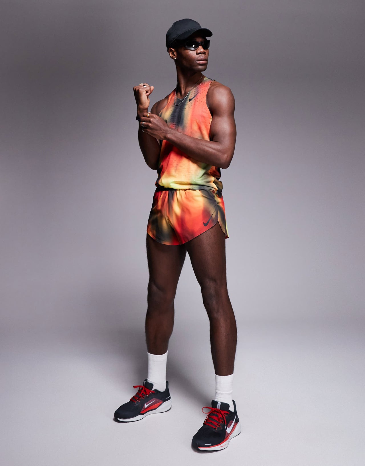 Nike Running Aeroswift Dri-FIT shorts in red, yellow and black