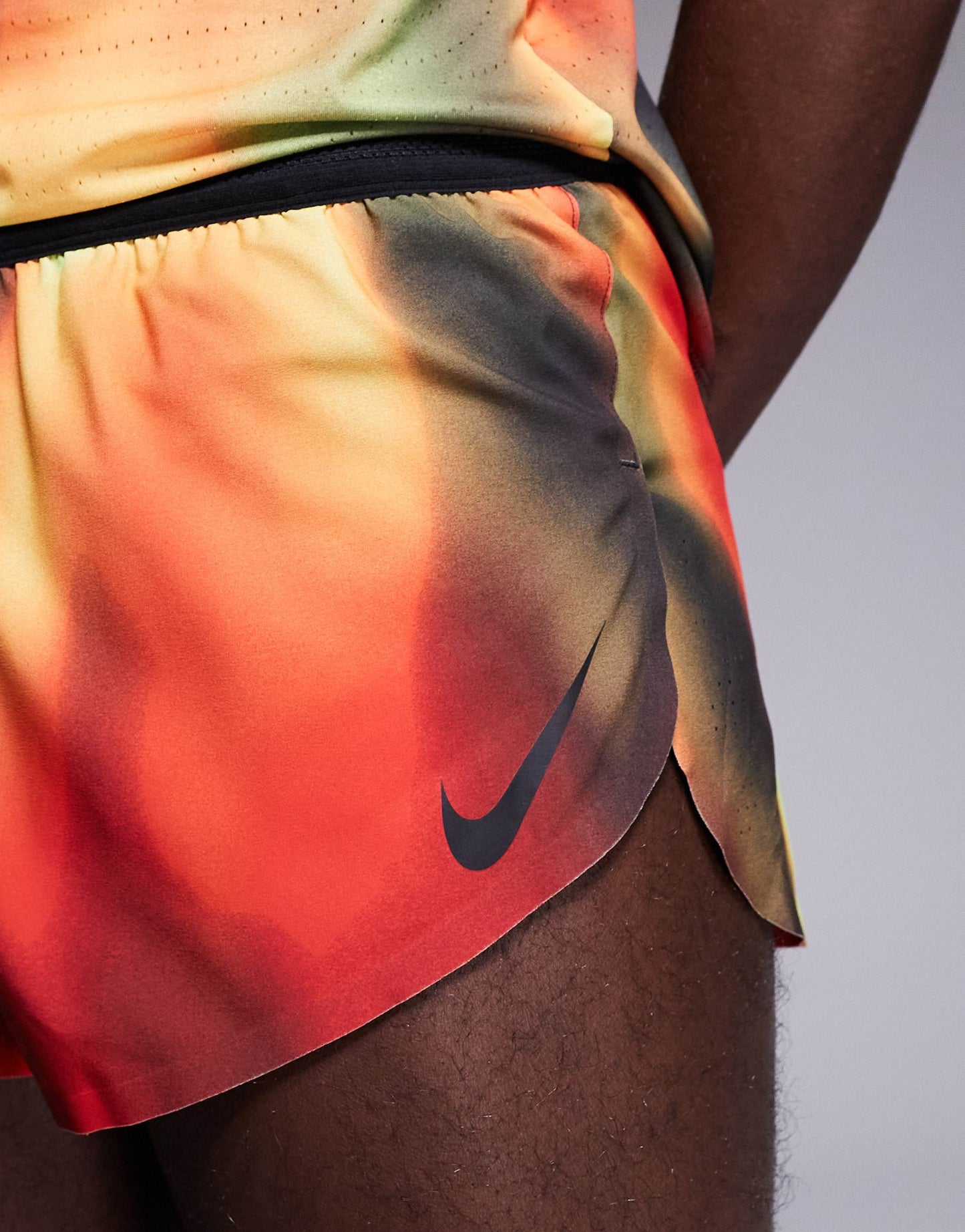 Nike Running Aeroswift Dri-FIT shorts in red, yellow and black