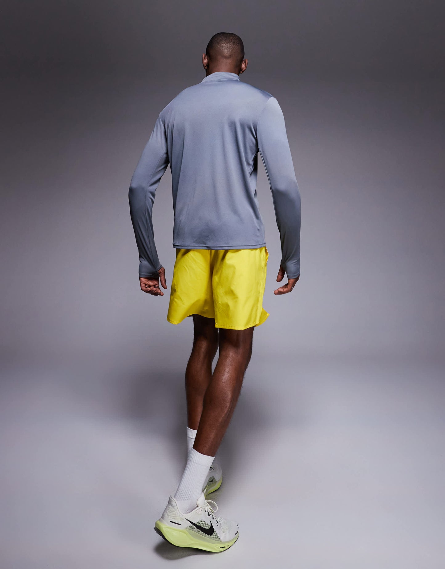 Nike Running Challenger Dri-FIT 7 inch shorts in yellow