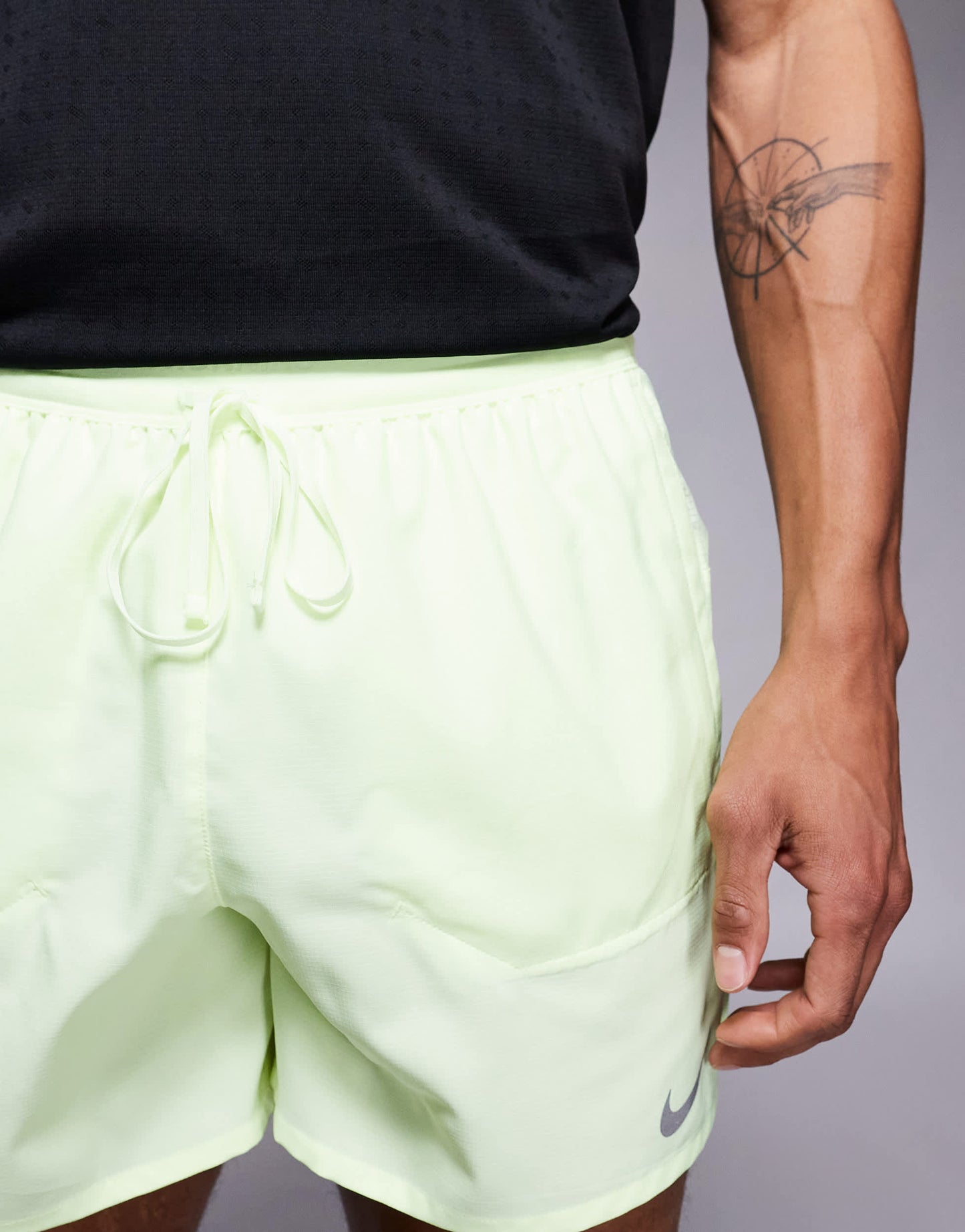 Nike Running Stride Dri-FIT 5 inch shorts in lime