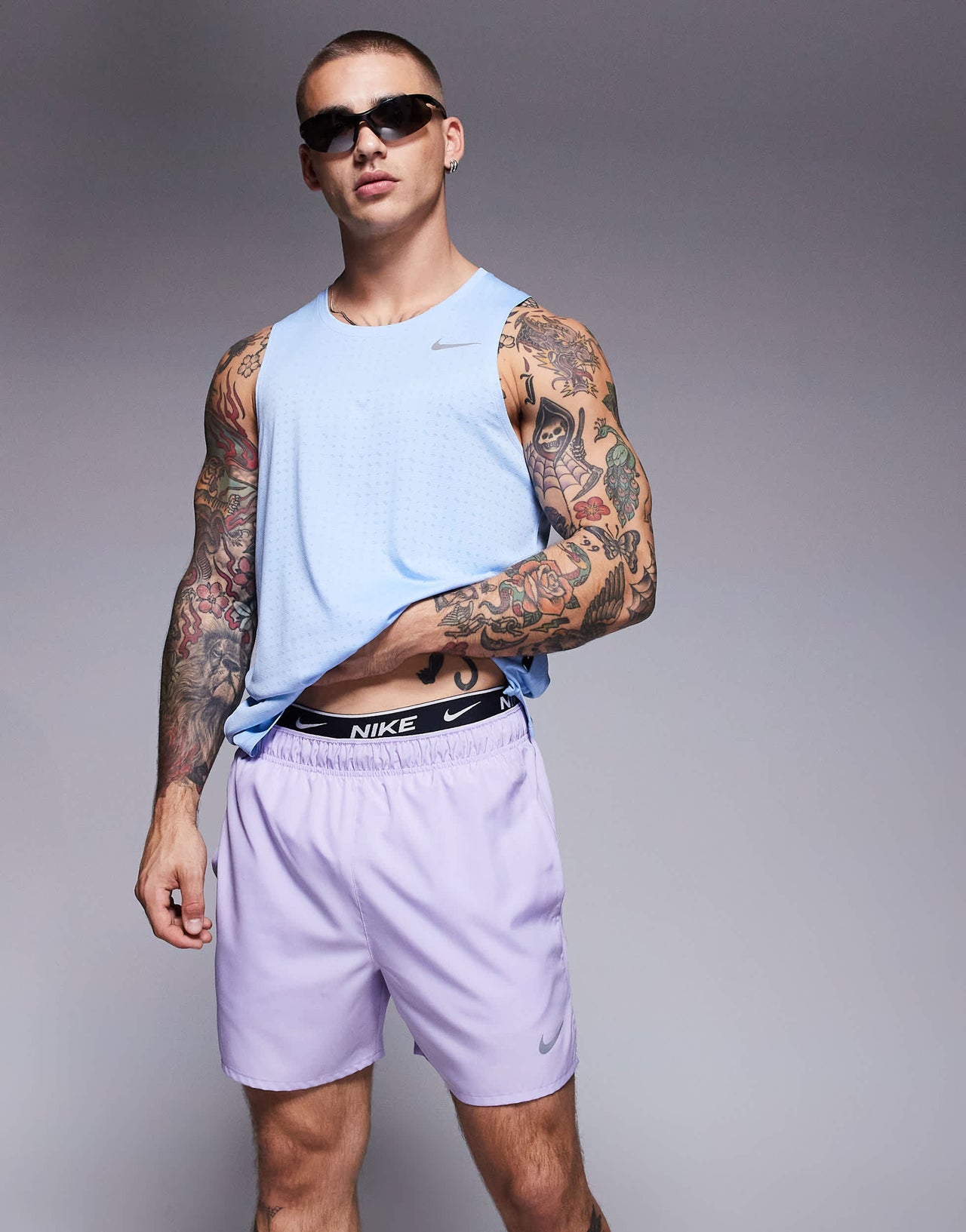 Nike Running Challenger Dri-FIT 5 inch shorts in lilac