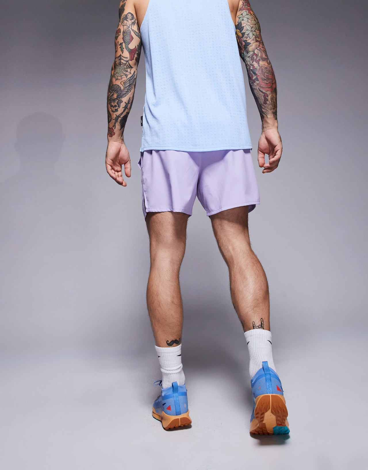 Nike Running Challenger Dri-FIT 5 inch shorts in lilac