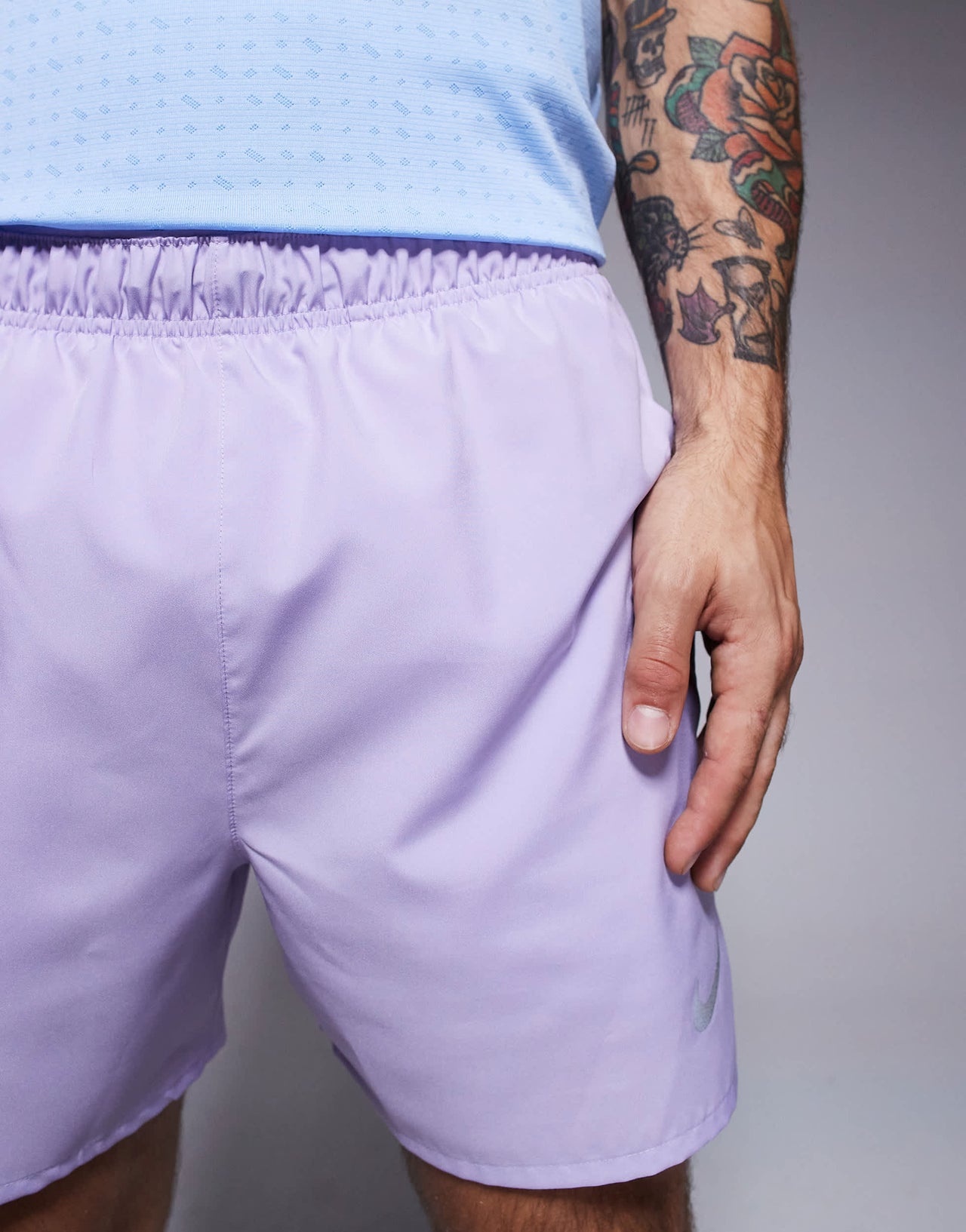 Nike Running Challenger Dri-FIT 5 inch shorts in lilac