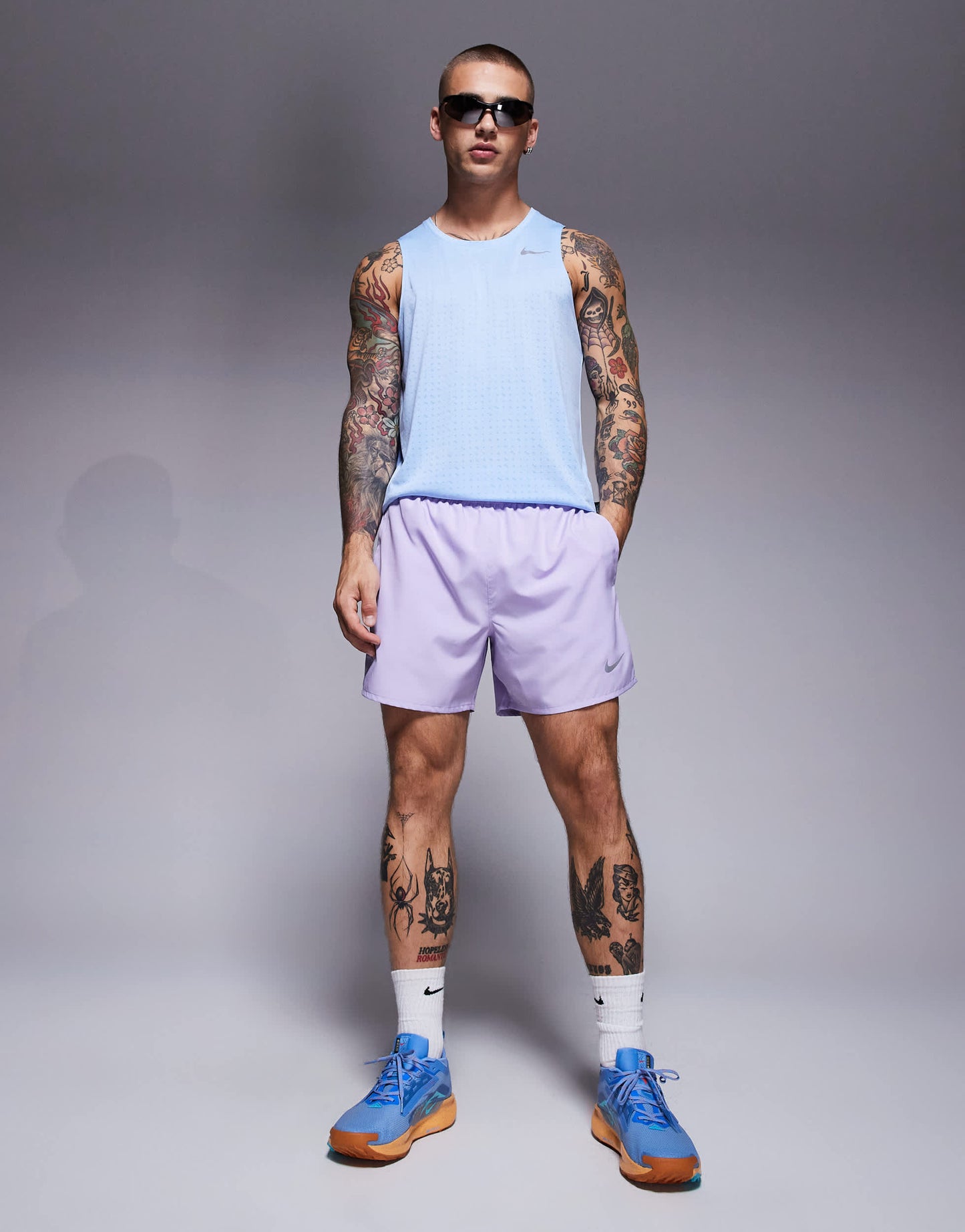 Nike Running Challenger Dri-FIT 5 inch shorts in lilac