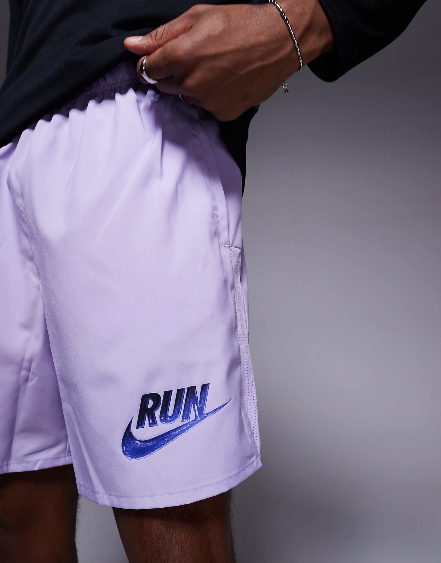 Nike Running Run Energy Challenger Dri-FIT 7 inch shorts in purple