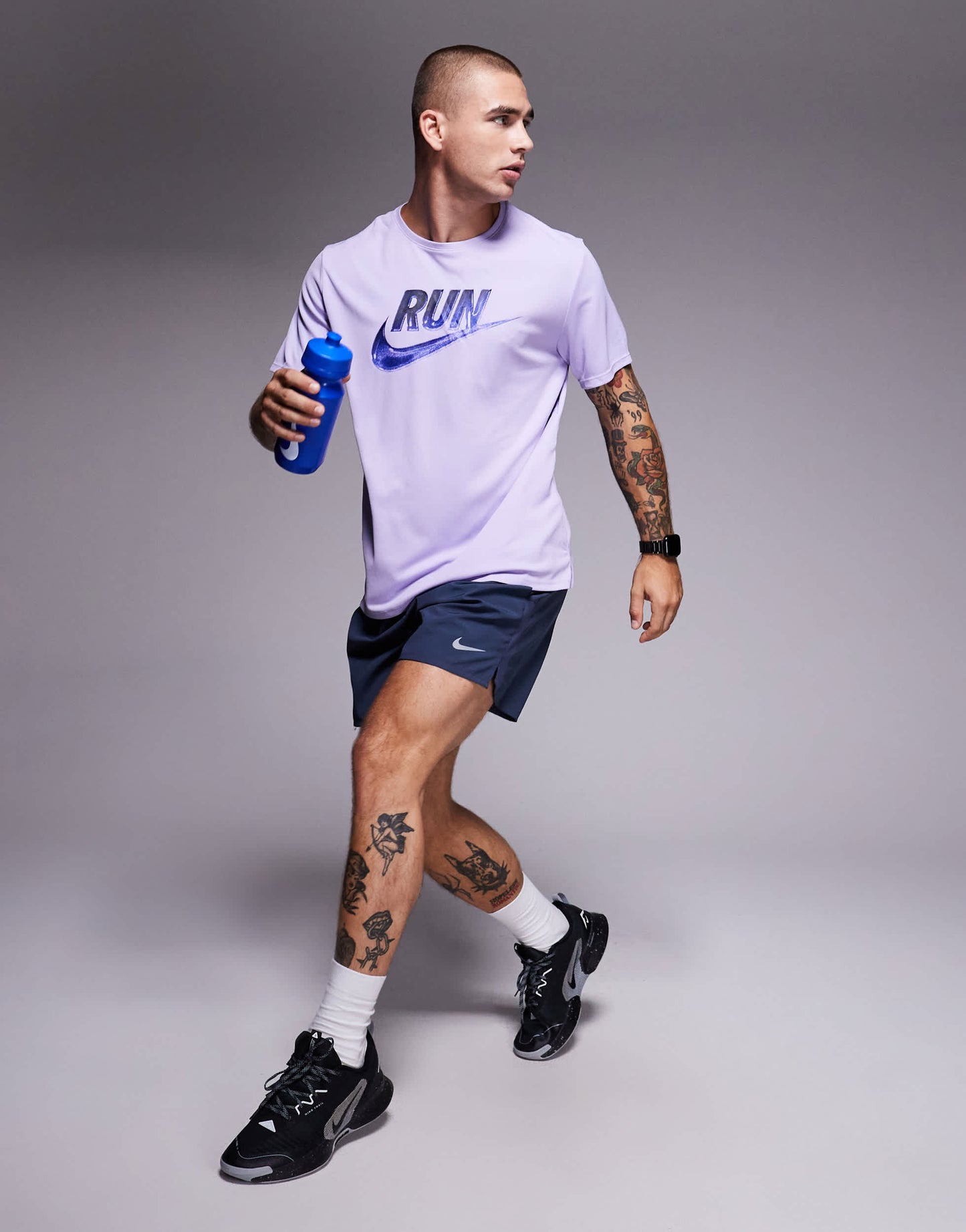 Nike Running Miler Run Energy Dri-FIT t-shirt in lilac