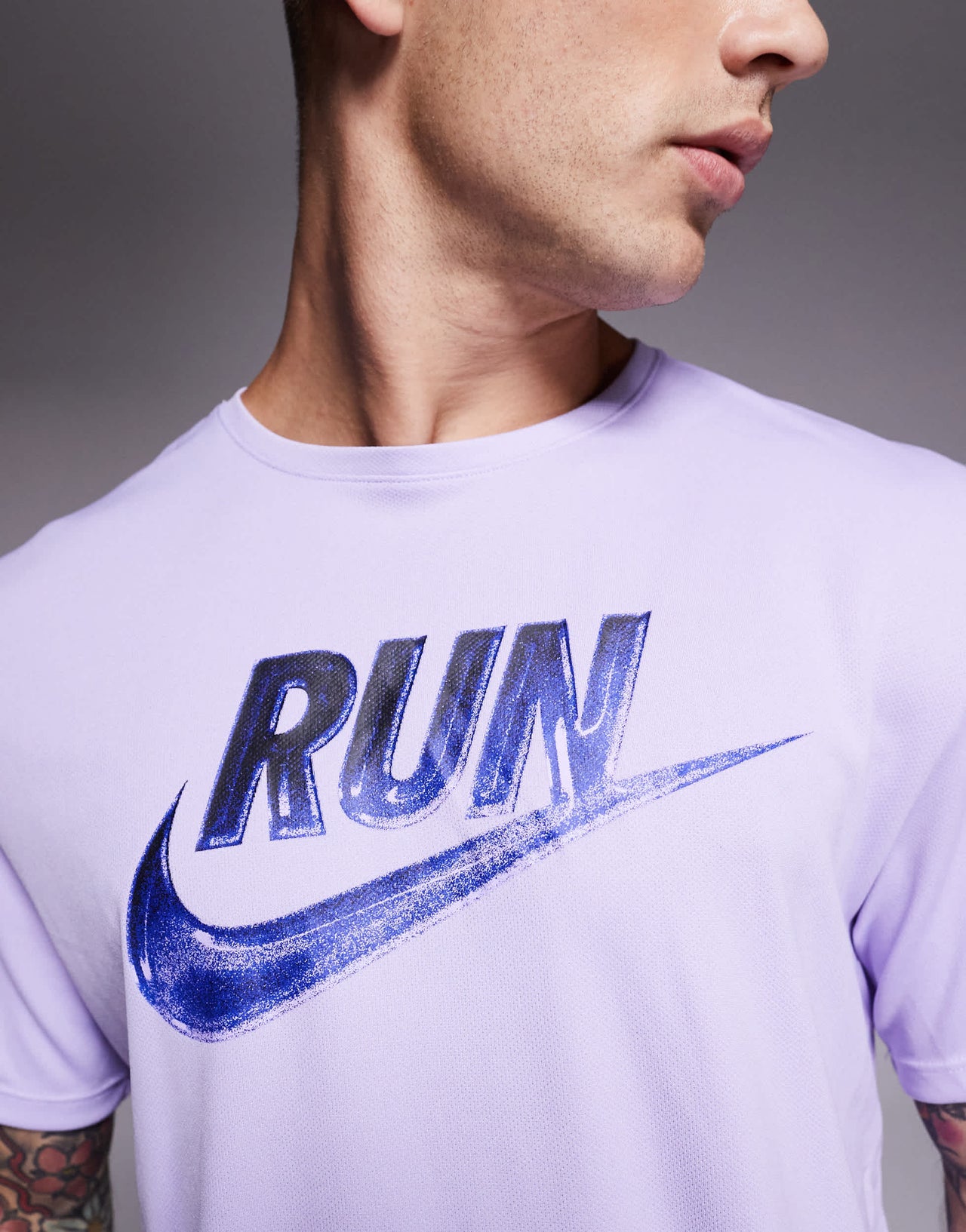 Nike Running Miler Run Energy Dri-FIT t-shirt in lilac
