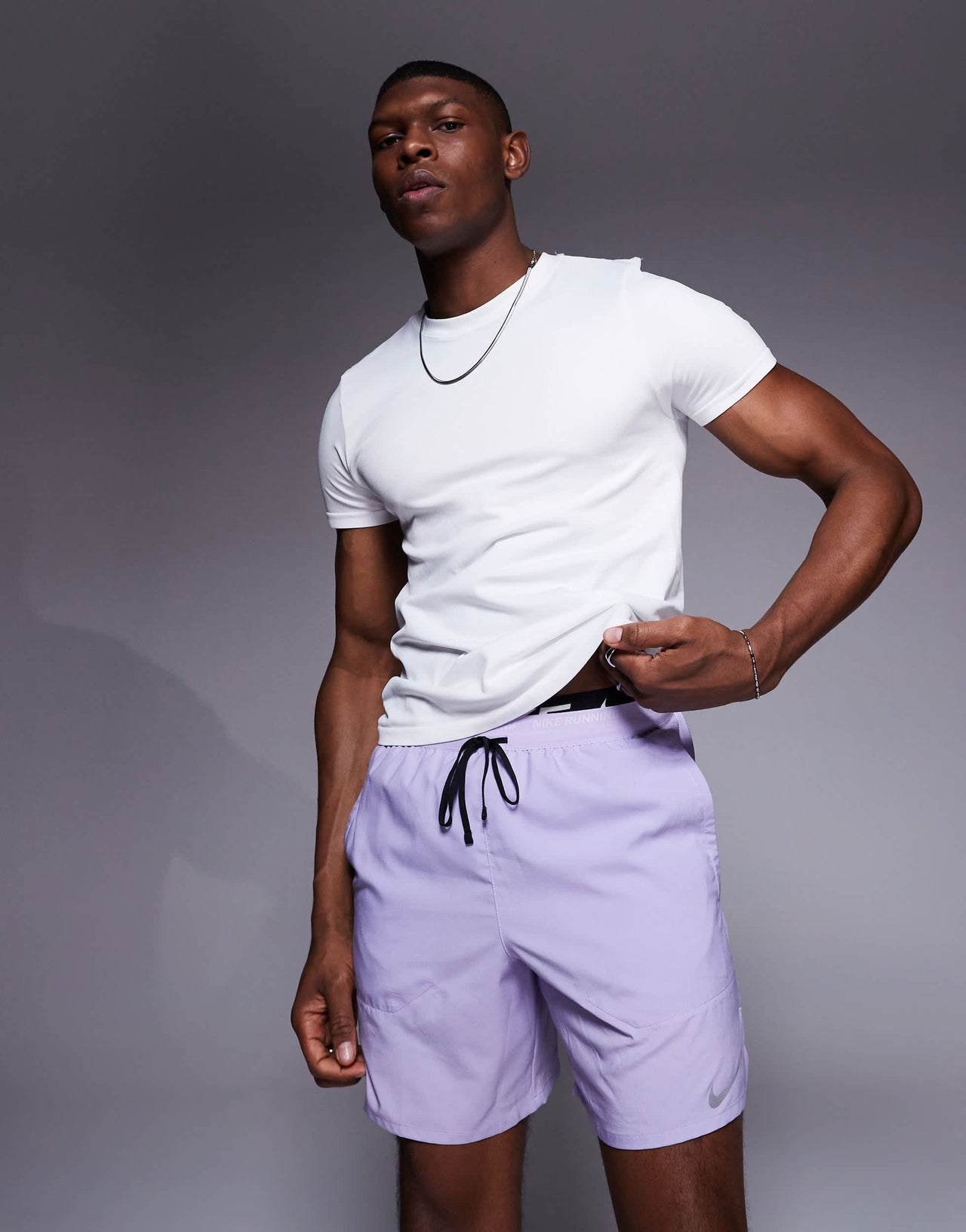 Nike Running Stride Dri-FIT 7 inch shorts in lilac