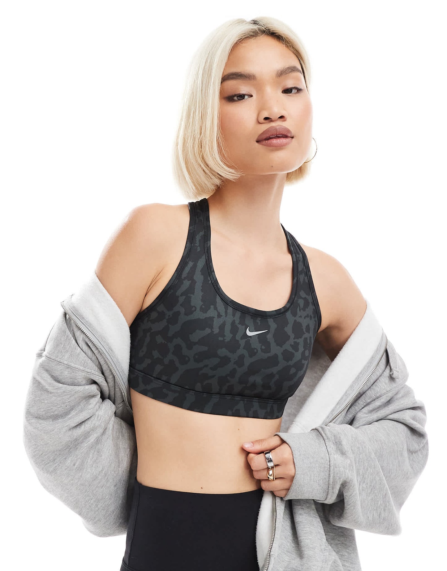 Nike Training Swoosh Leopard Print medium support sports bra in black