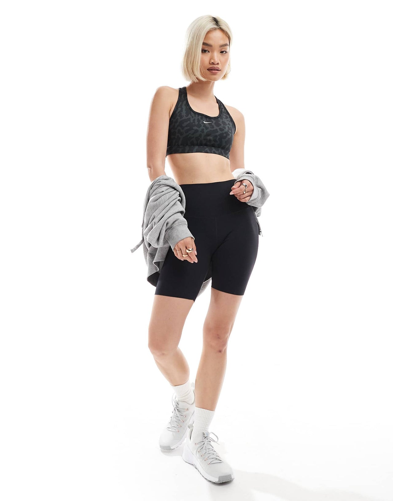 Nike Training Swoosh Leopard Print medium support sports bra in black