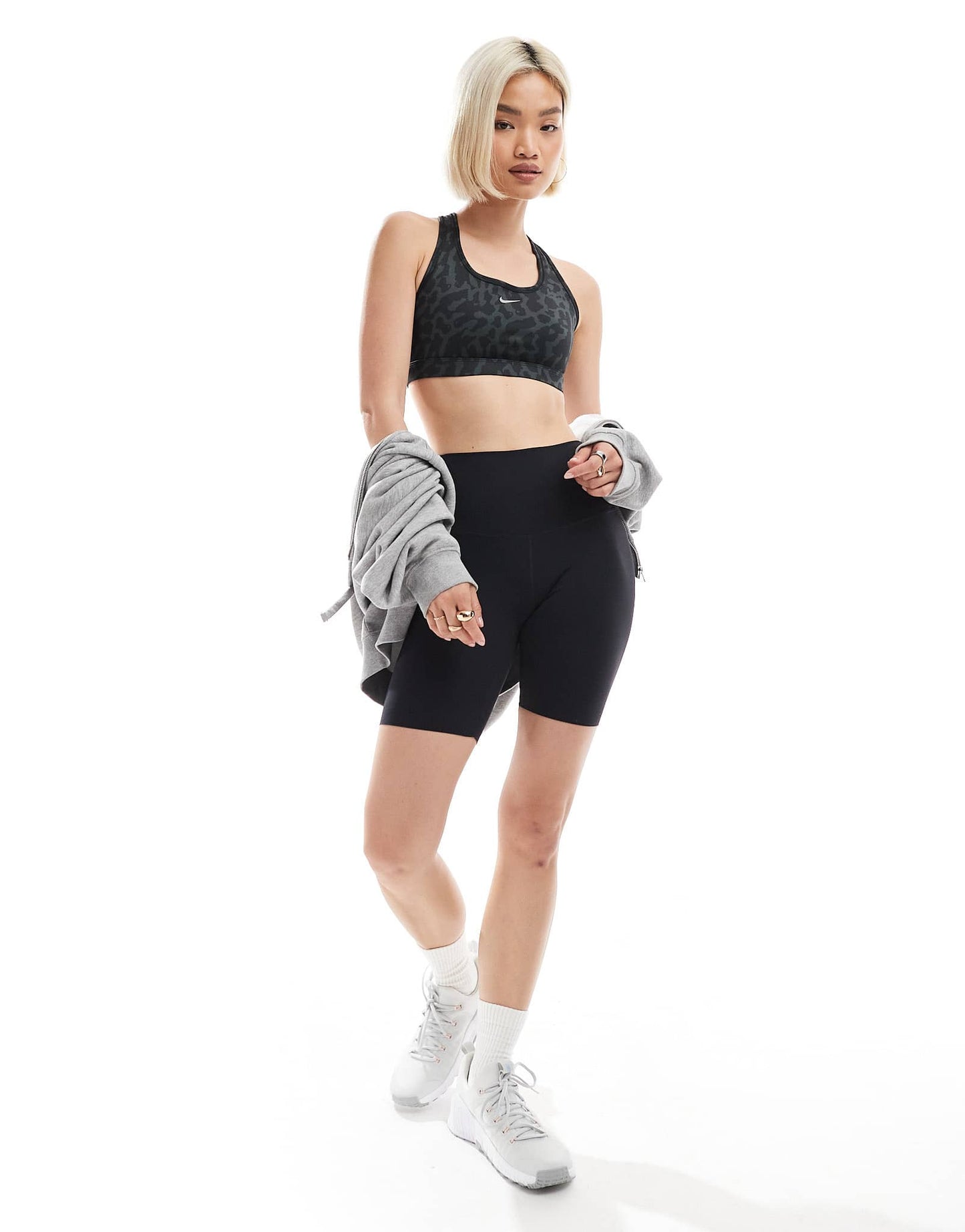 Nike Training Swoosh Leopard Print medium support sports bra in black