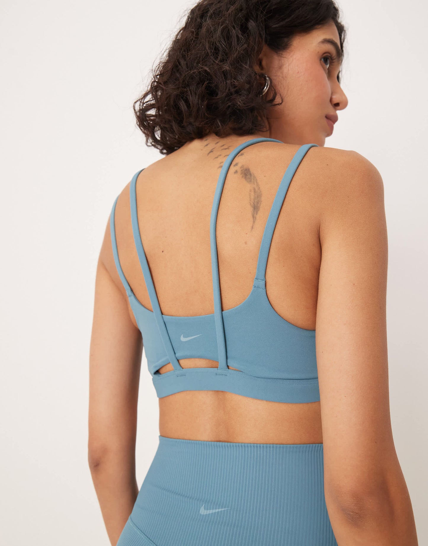 Nike Training Zenvy Dri-FIT soft touch Alate light support sports bra in blue