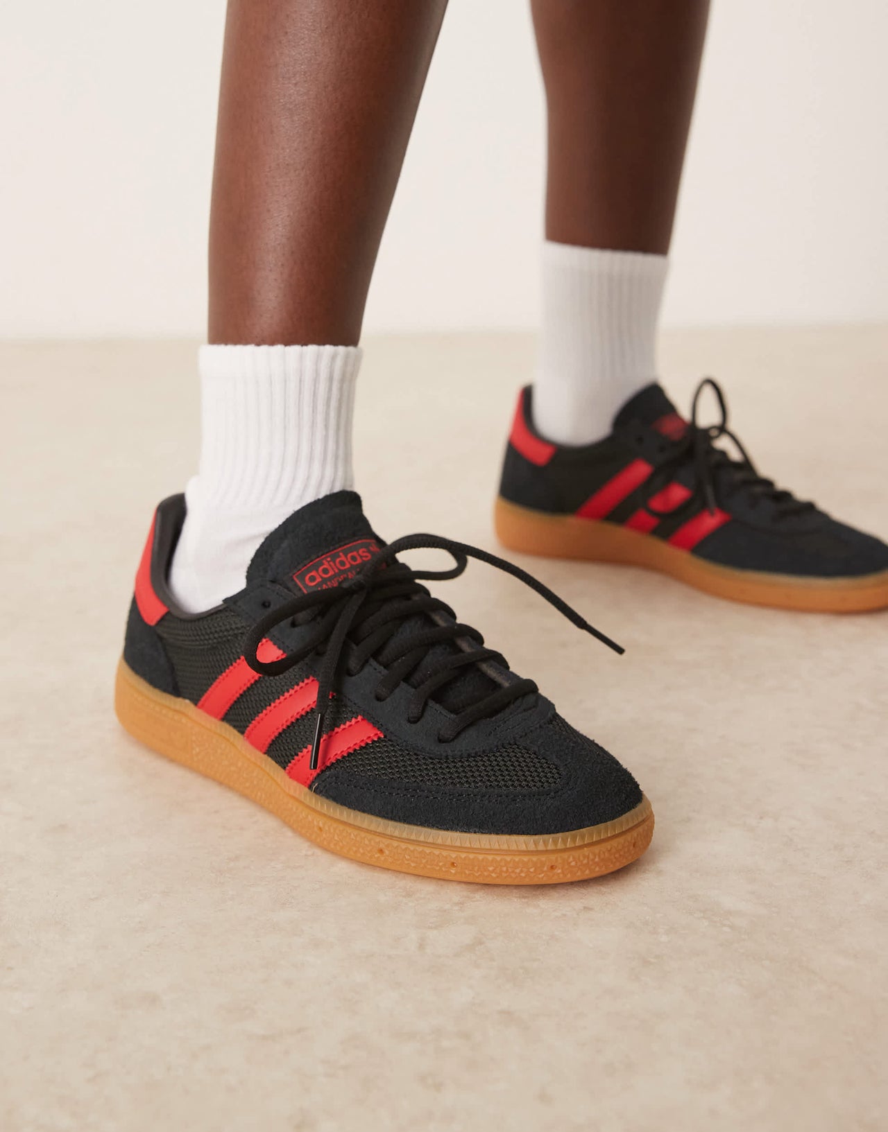 adidas Originals Handball Spezial trainers in black and red