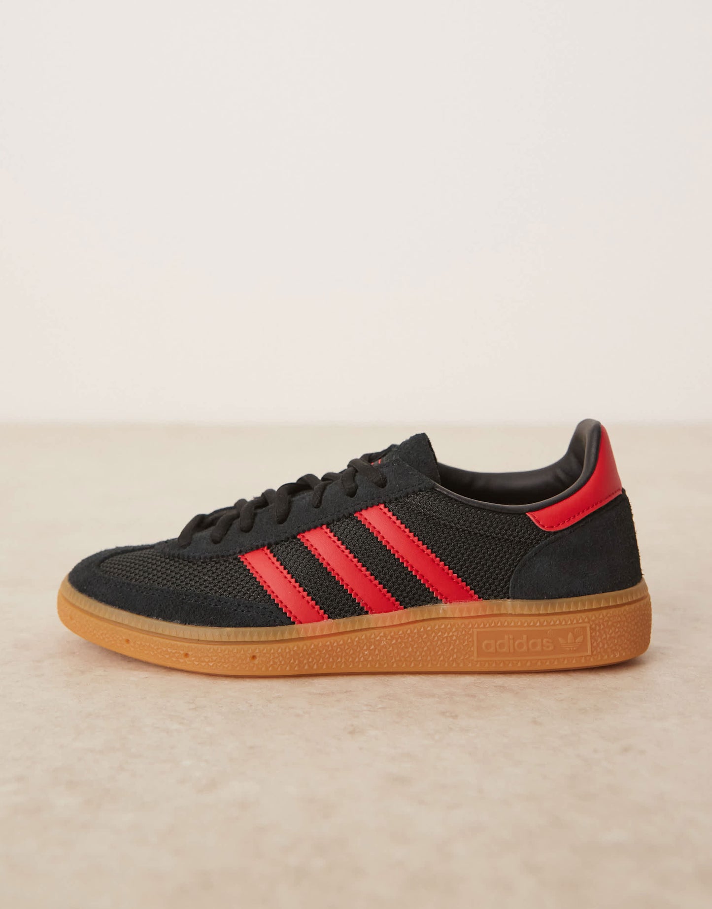 adidas Originals Handball Spezial trainers in black and red