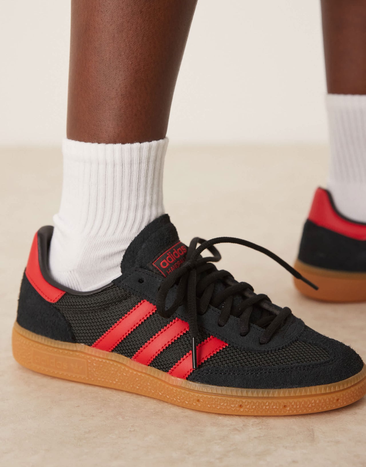 adidas Originals Handball Spezial trainers in black and red