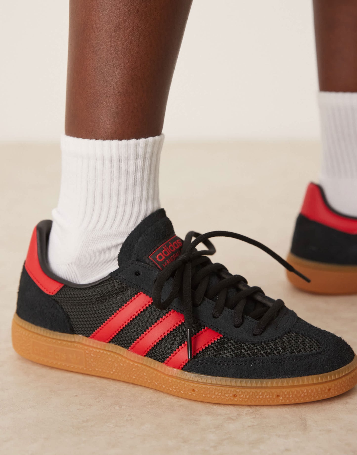 adidas Originals Handball Spezial trainers in black and red