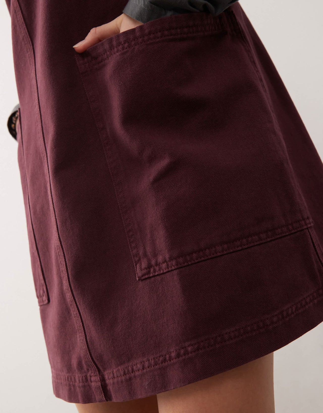 COLLUSION denim pinny dress in burgundy