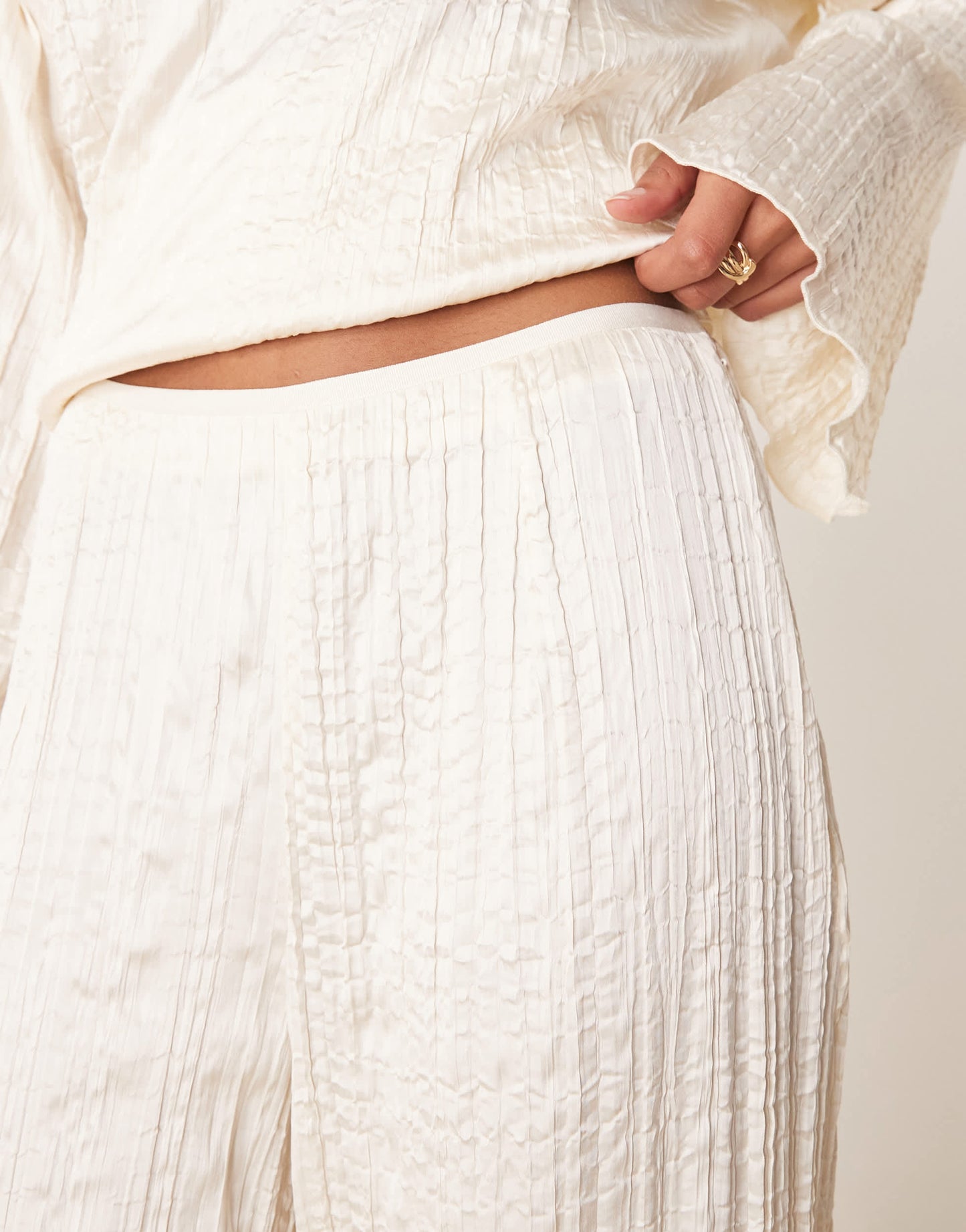 ASOS DESIGN crinkle satin wide leg trousers co-ord in off white