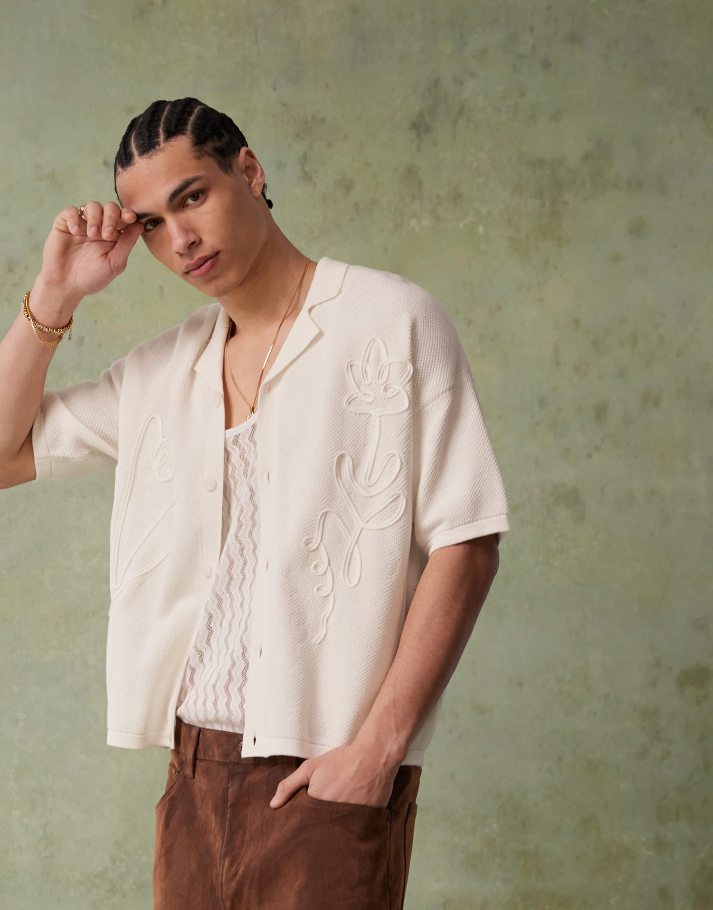 ASOS DESIGN relaxed knitted button through polo with floral embroidery in ecru