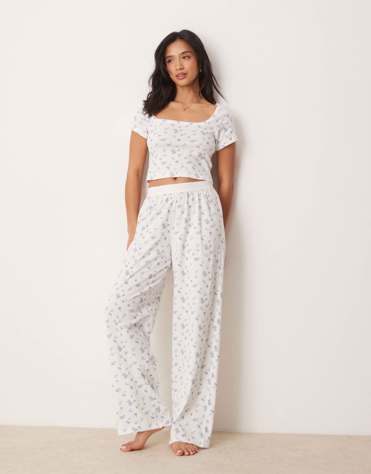 ASOS DESIGN Petite mix & match pyjama trouser with exposed waistband and picot trim in ditsy print