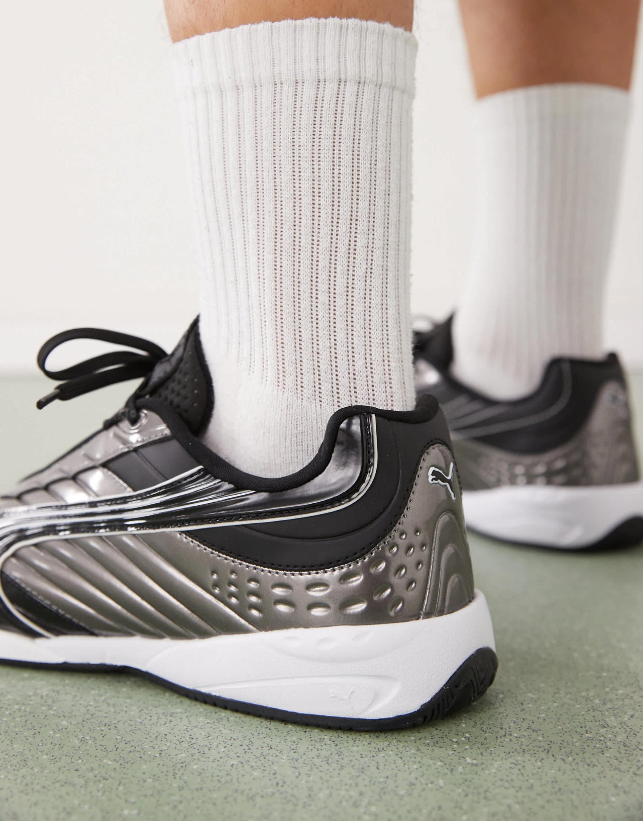 Puma V1PER trainers in black & silver