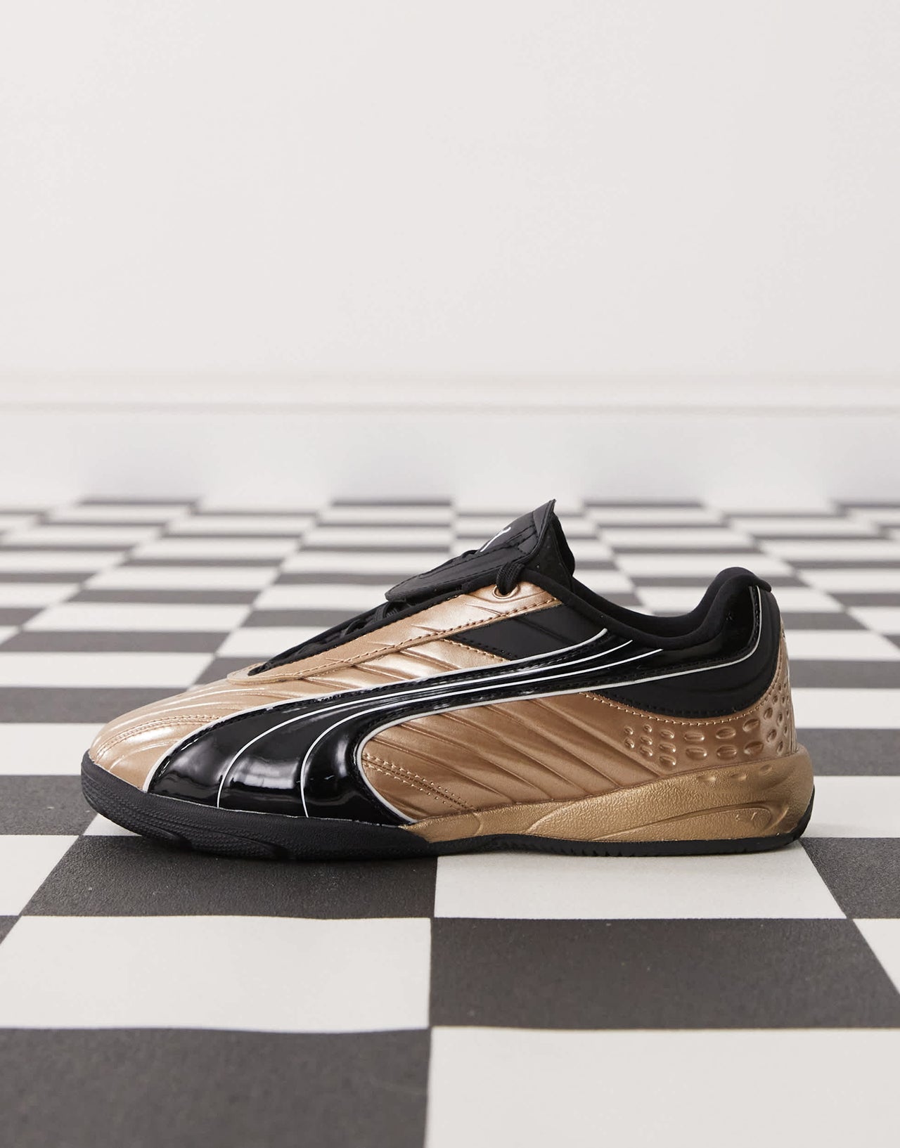 Puma V1PER trainers in gold