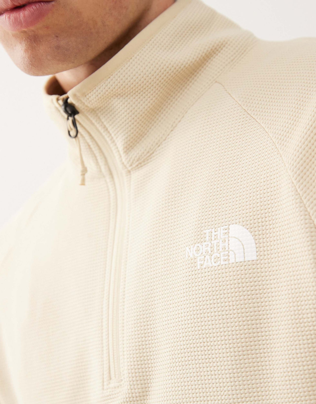 The North Face Kecha 1/4 zip packable anorak in off white exclusive to ASOS