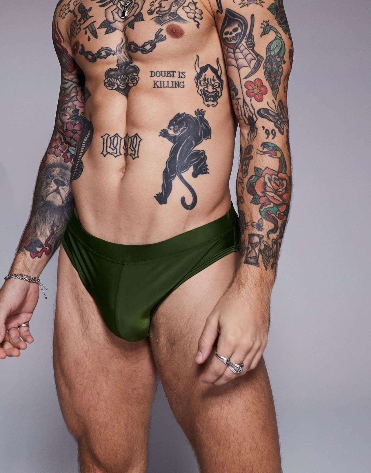 ASOS DESIGN swim briefs in green