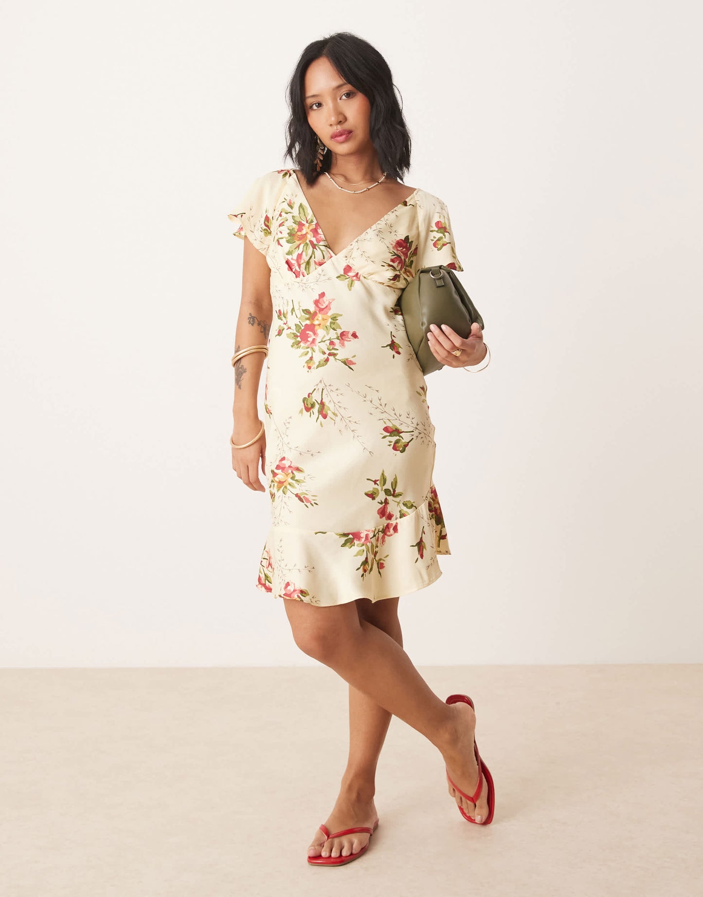 ASOS DESIGN Petite flutter sleeve mini dress in floral print