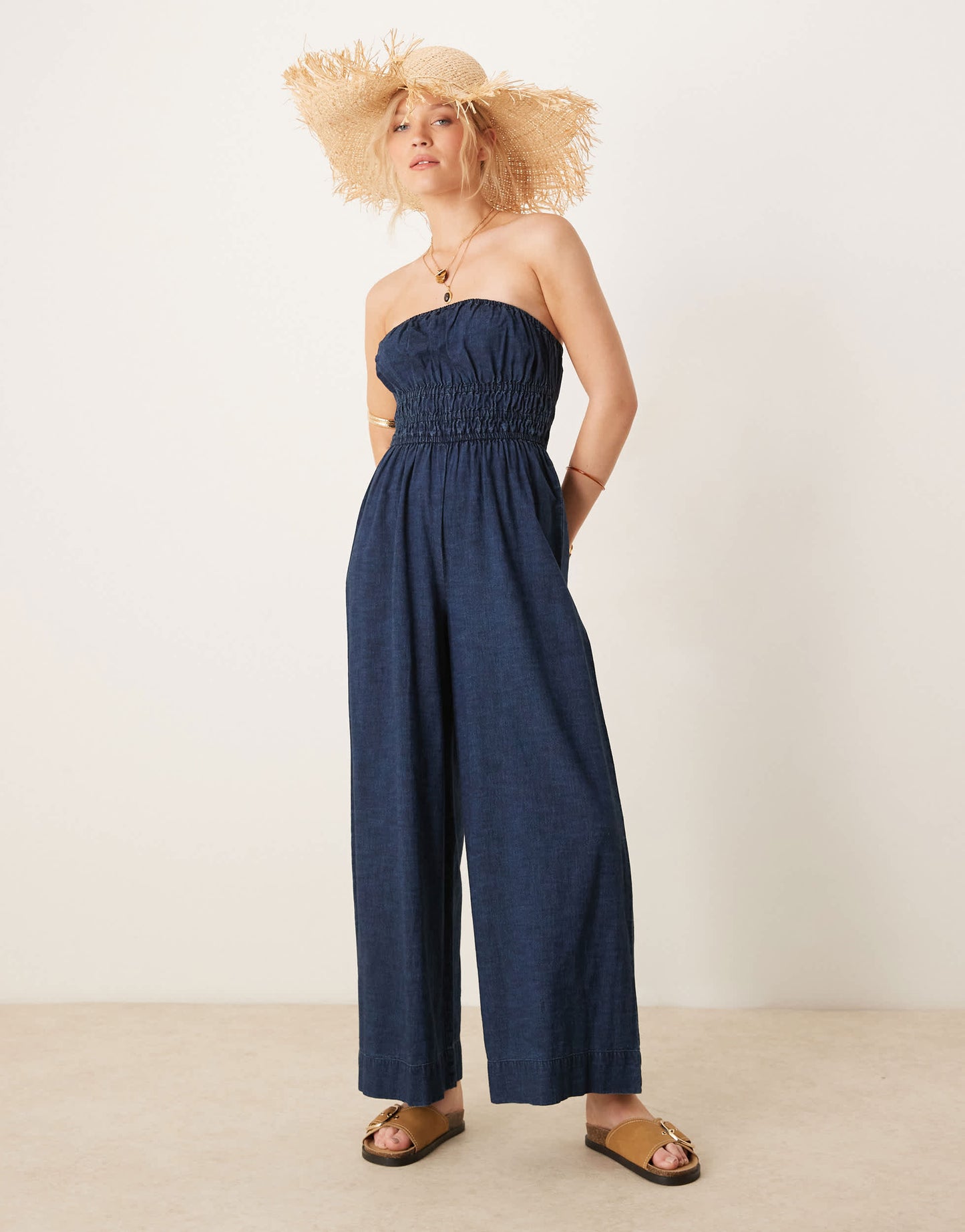 ASOS DESIGN soft denim strapless wide leg jumpsuit with shirring waist in rinse wash