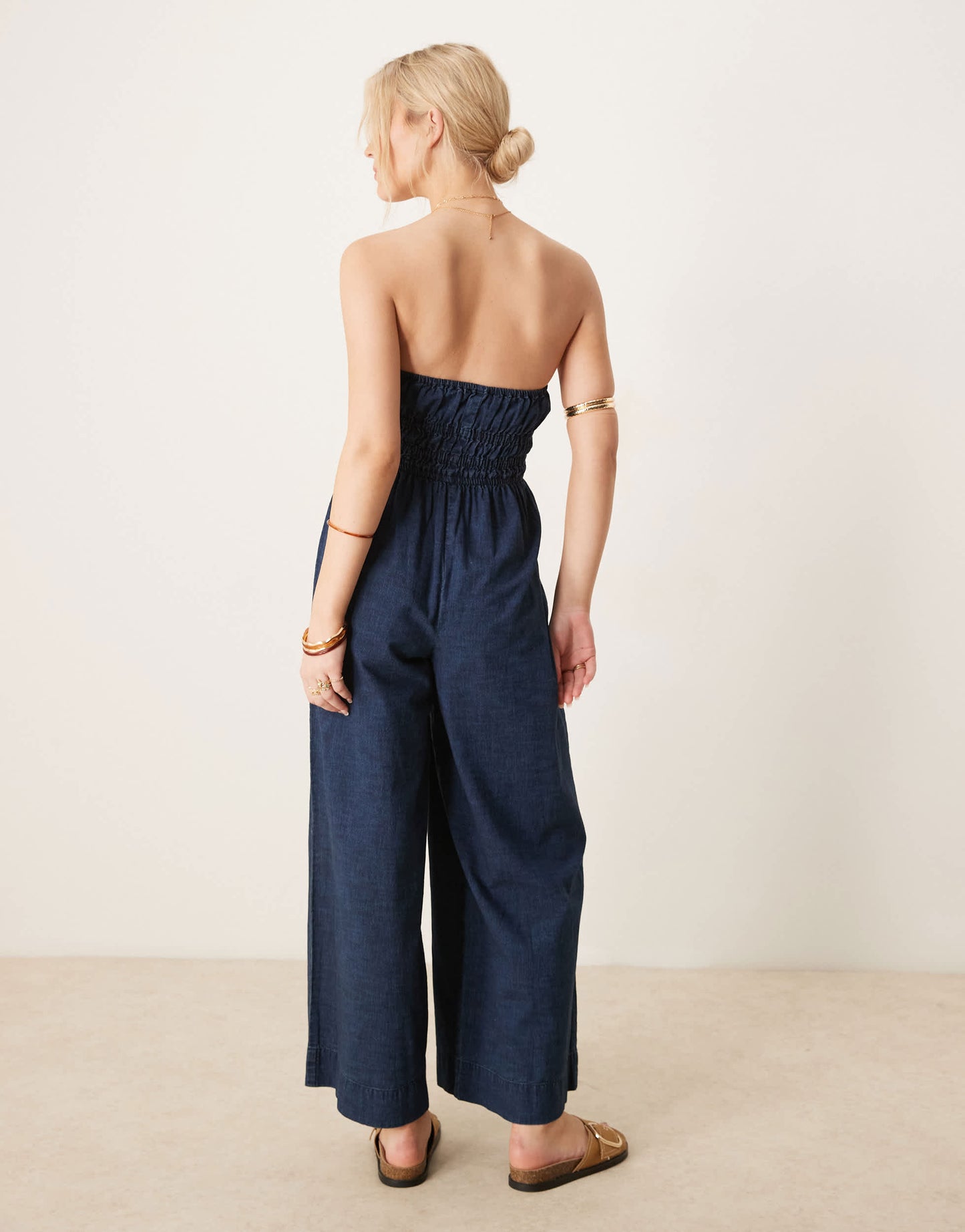 ASOS DESIGN soft denim strapless wide leg jumpsuit with shirring waist in rinse wash