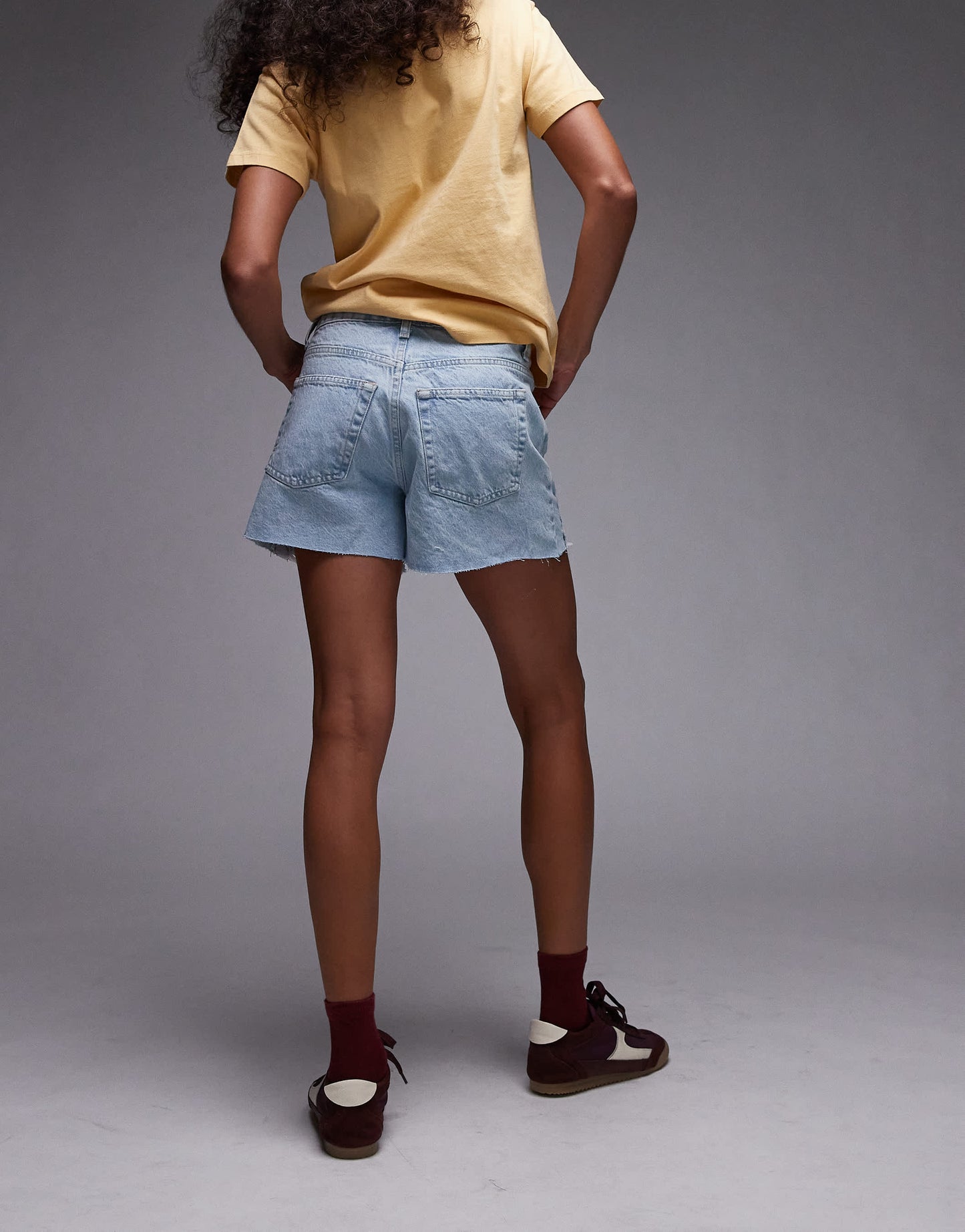 Topshop denim A-line shorts with rip in bleach