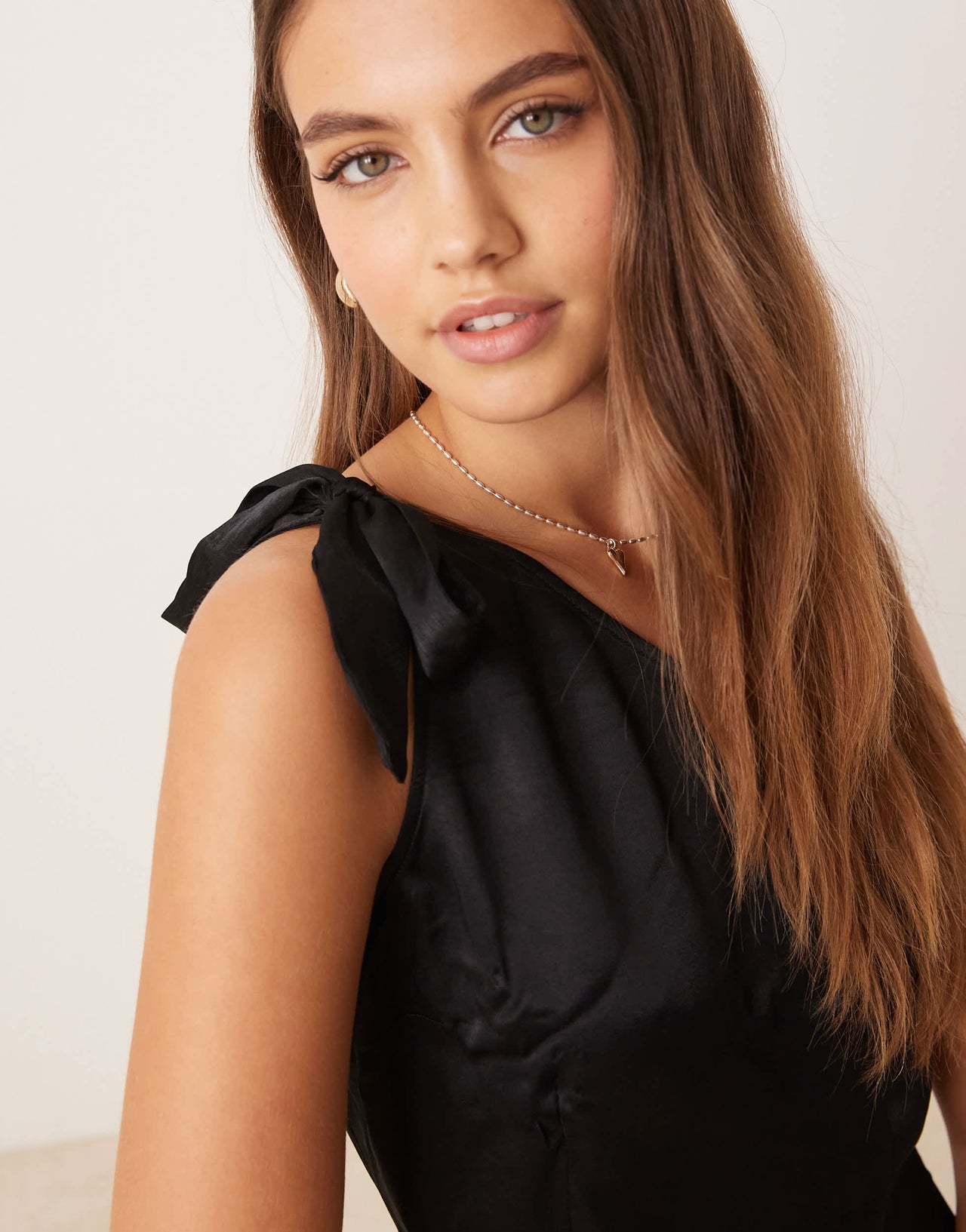 ASOS DESIGN one shoulder mini dress with bow detail in black