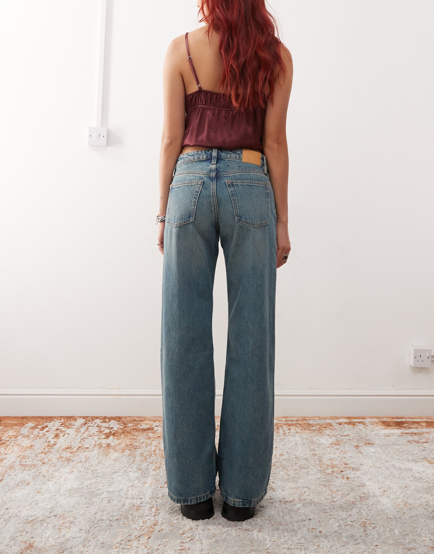 Monki Imoo low waisted wide fit jeans in mid blue wash