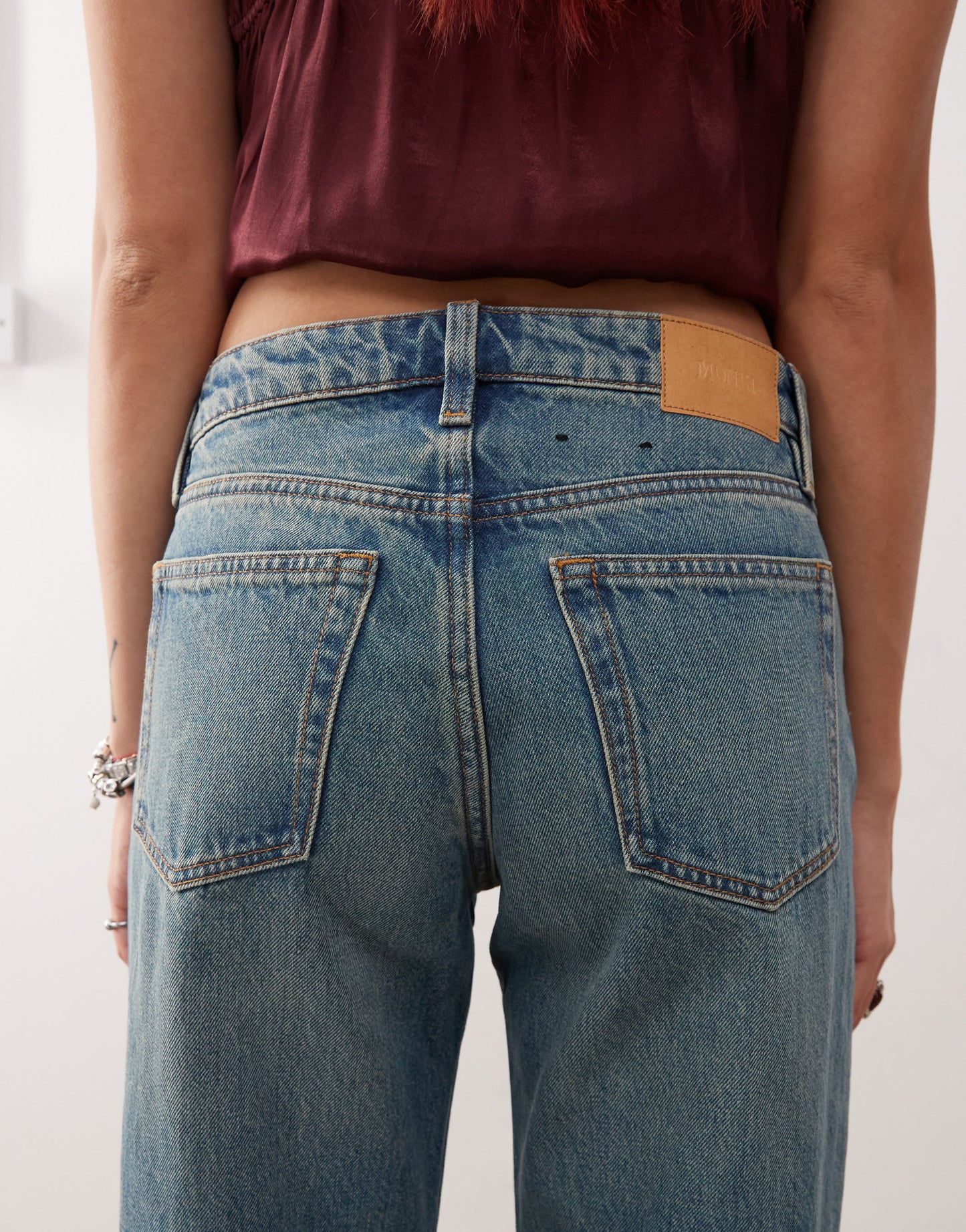 Monki Imoo low waisted wide fit jeans in mid blue wash