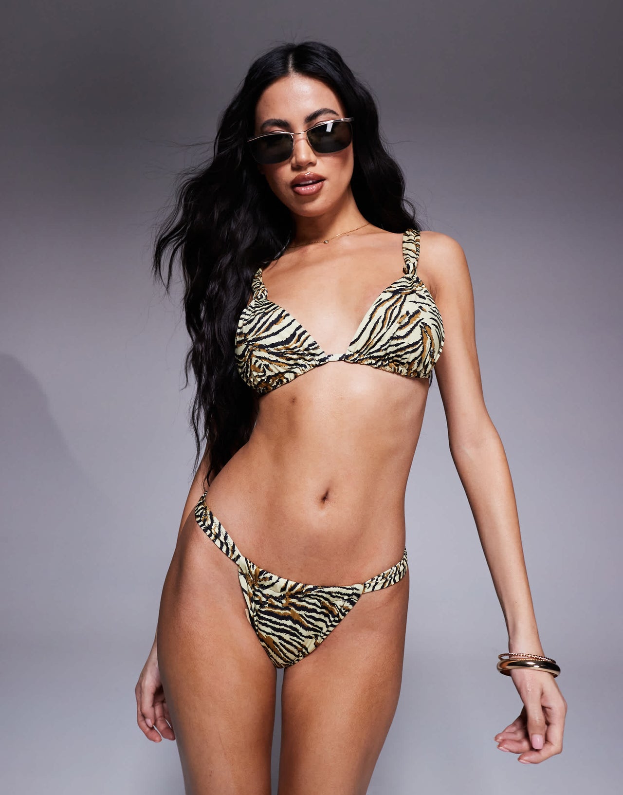 ASOS DESIGN Gia tanga bikini bottom in animal print