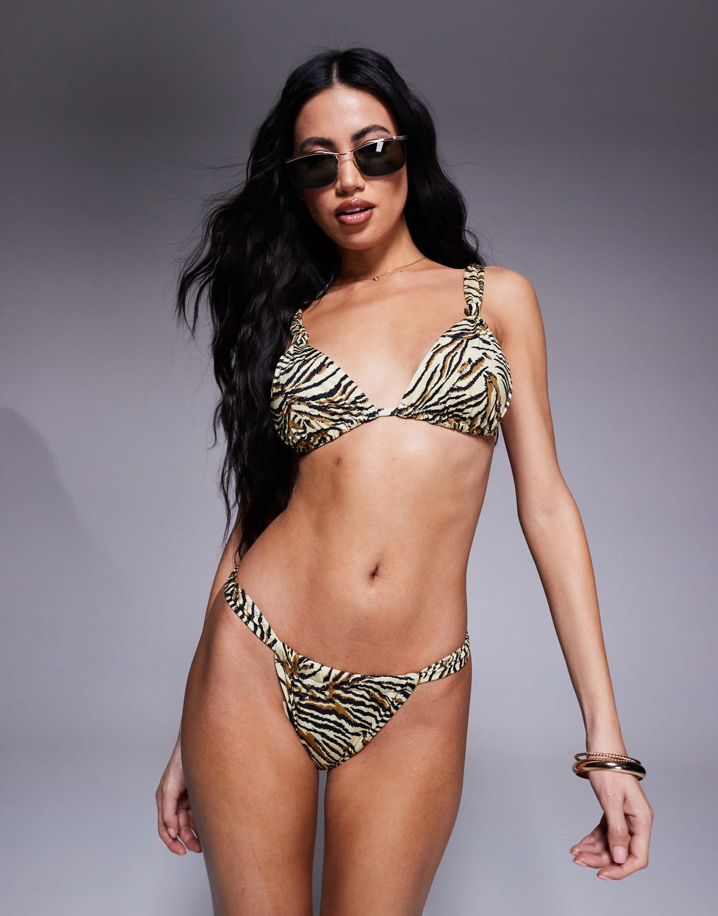 ASOS DESIGN Gia tanga bikini bottom in animal print