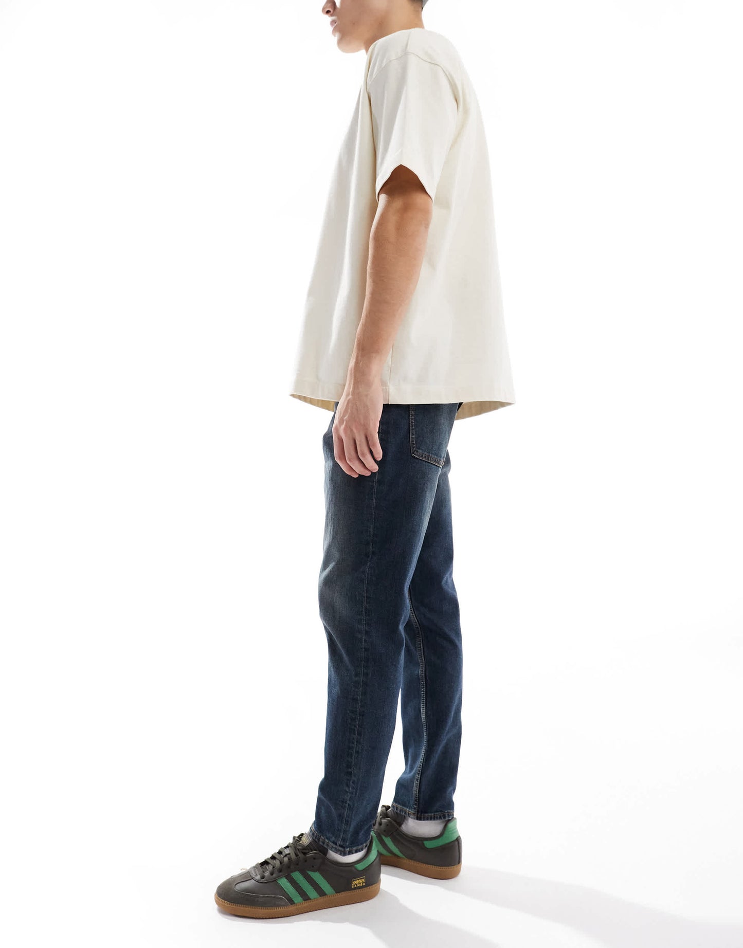 ASOS DESIGN stretch tapered with tint in dark wash blue