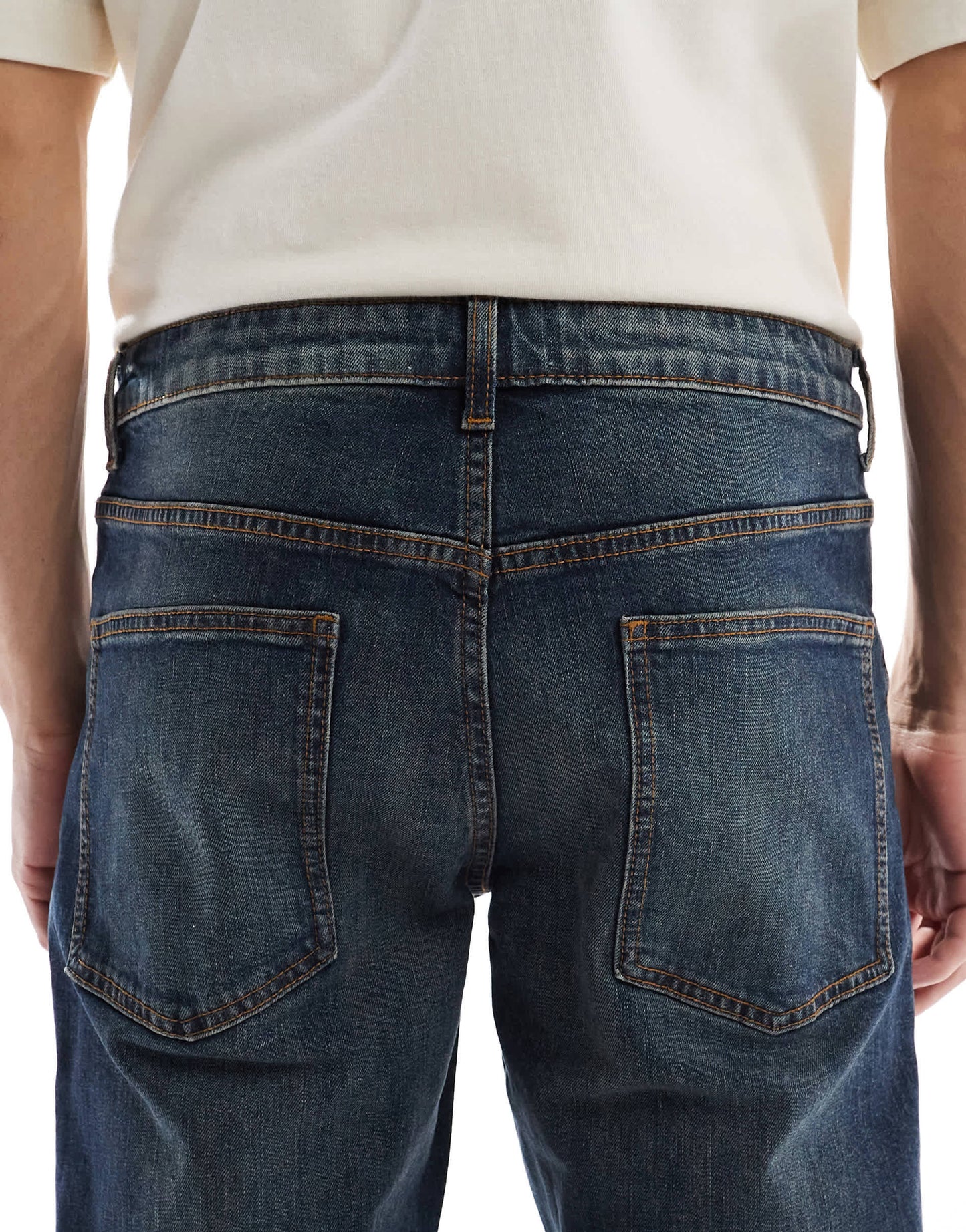 ASOS DESIGN stretch tapered with tint in dark wash blue