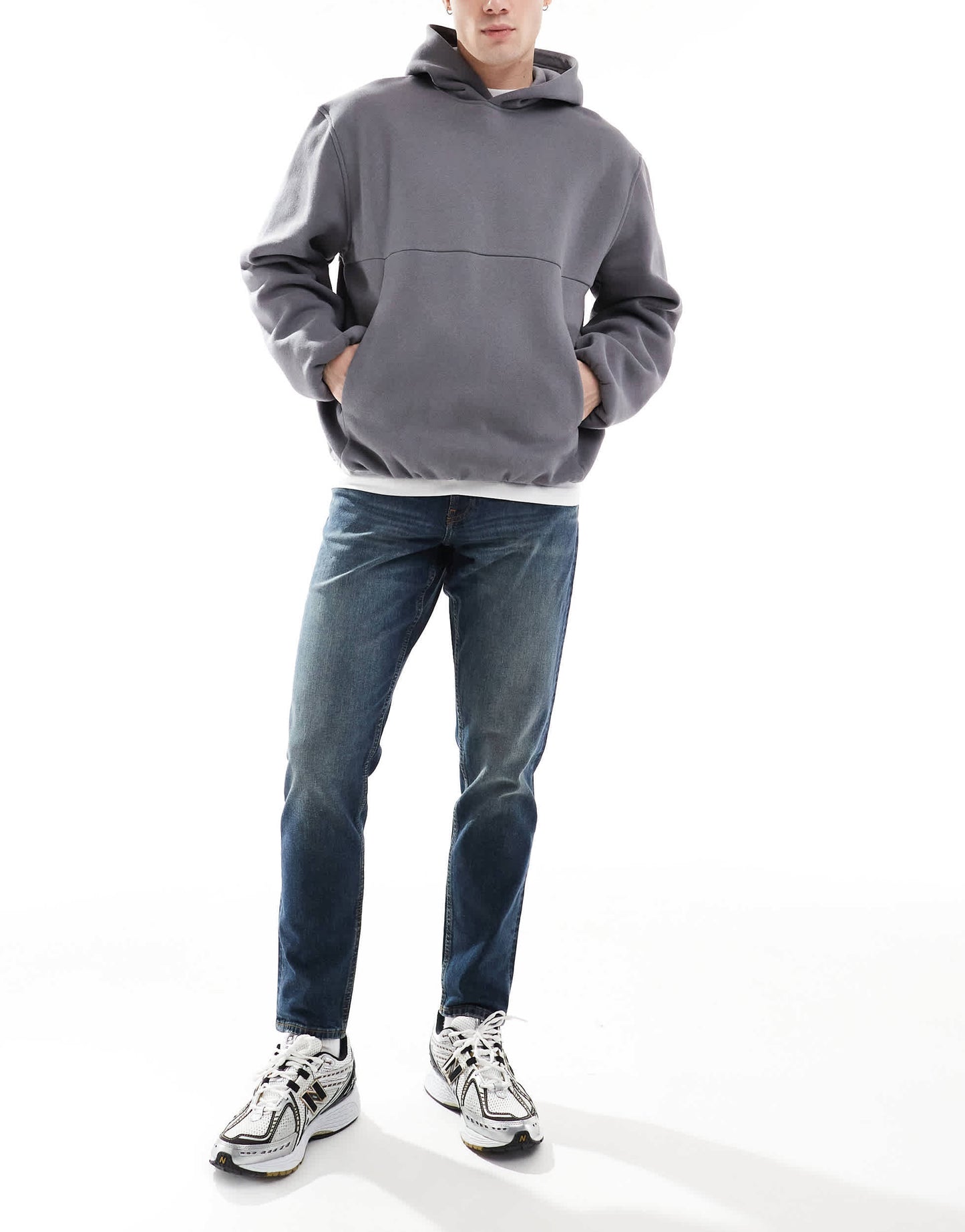 ASOS DESIGN stretch tapered in mid wash blue