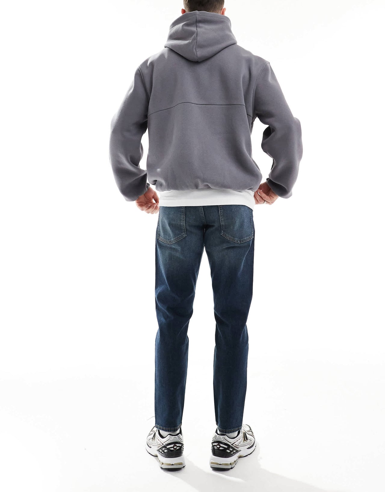 ASOS DESIGN stretch tapered in mid wash blue