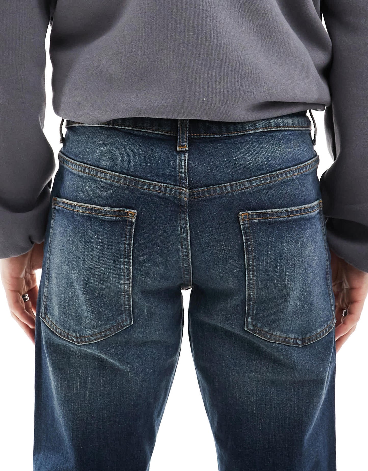 ASOS DESIGN stretch tapered in mid wash blue