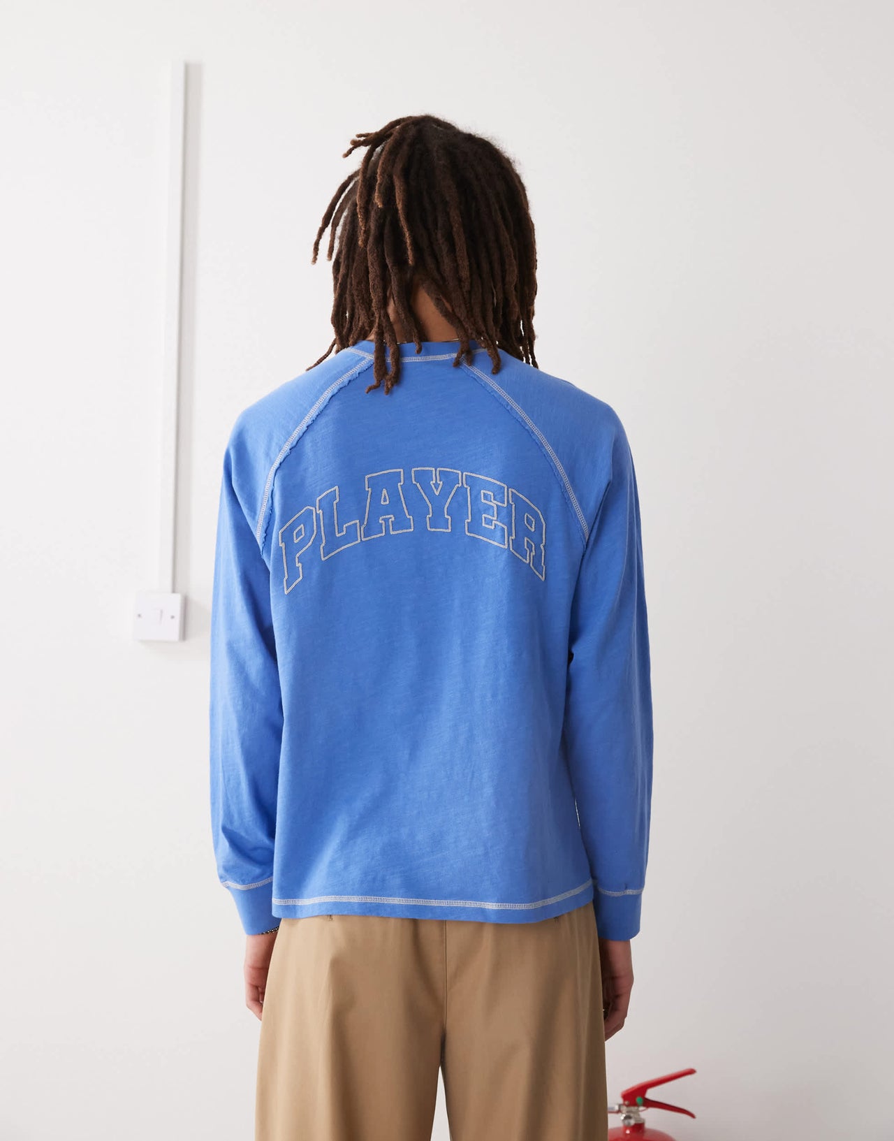 COLLUSION Long sleeve t-shirt with varisty print in blue