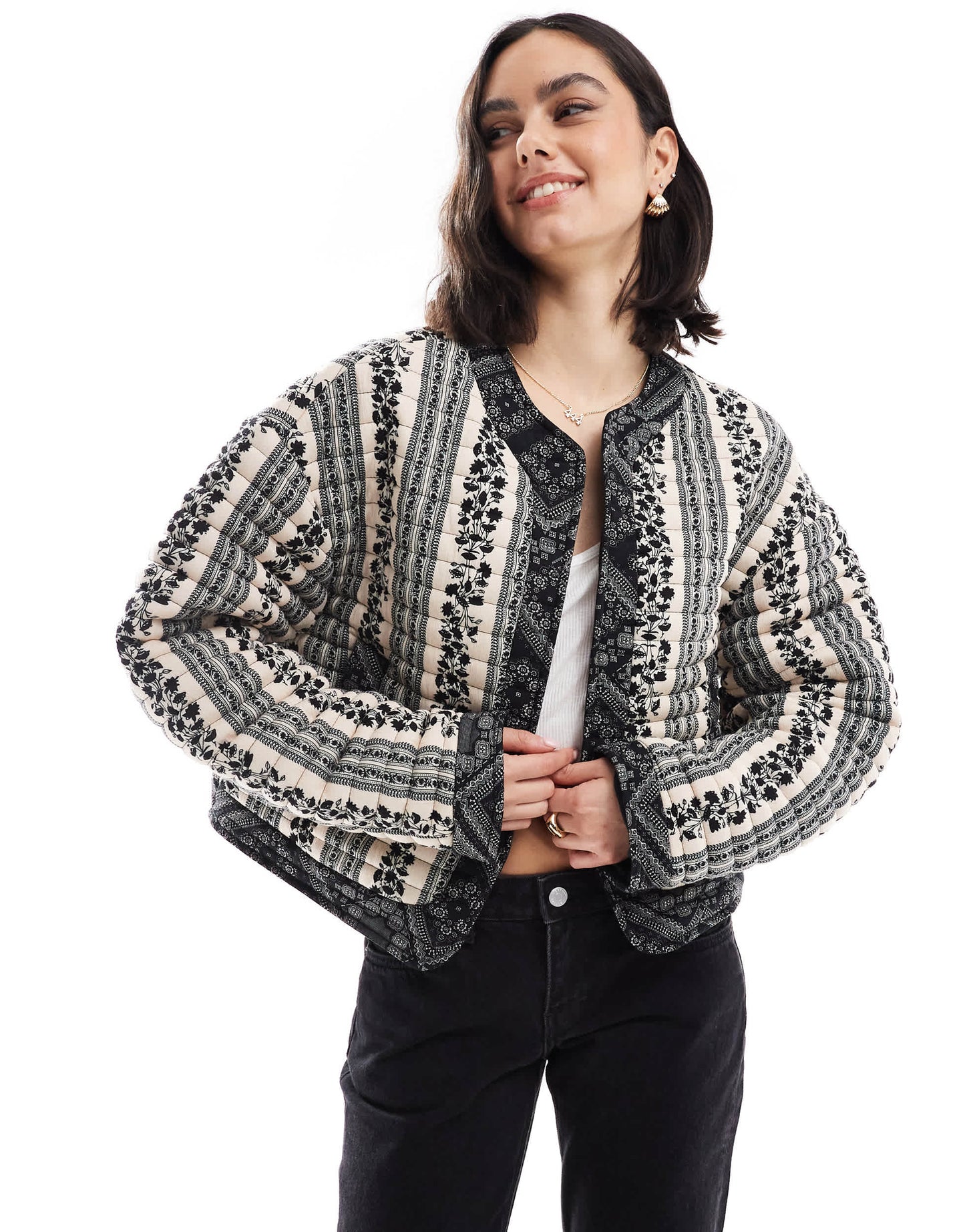 ASOS DESIGN cropped quilted jacket in patchwork in black and white floral