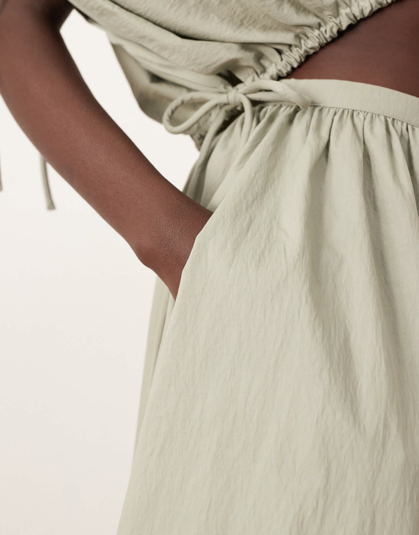 ARRANGE full skirt co-ord with drop waist detail in sage
