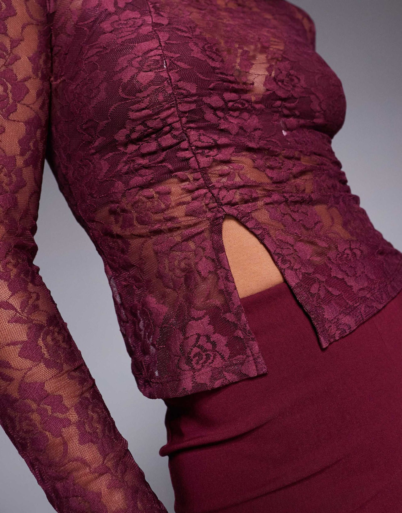 ASOS DESIGN sheer lace asymmetric top in burgundy