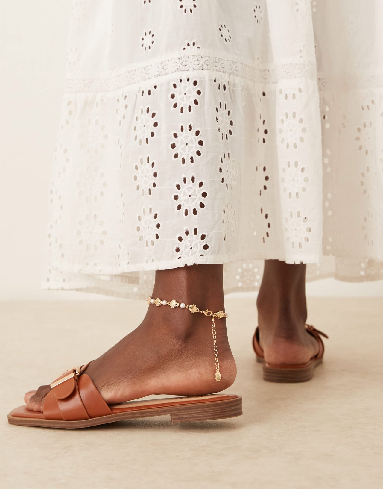 RAID Nikola buckle flat sandals in tan