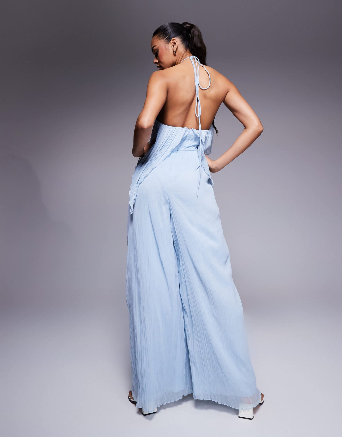 ASOS DESIGN textured halter wide leg jumpsuit with frill detail in light blue