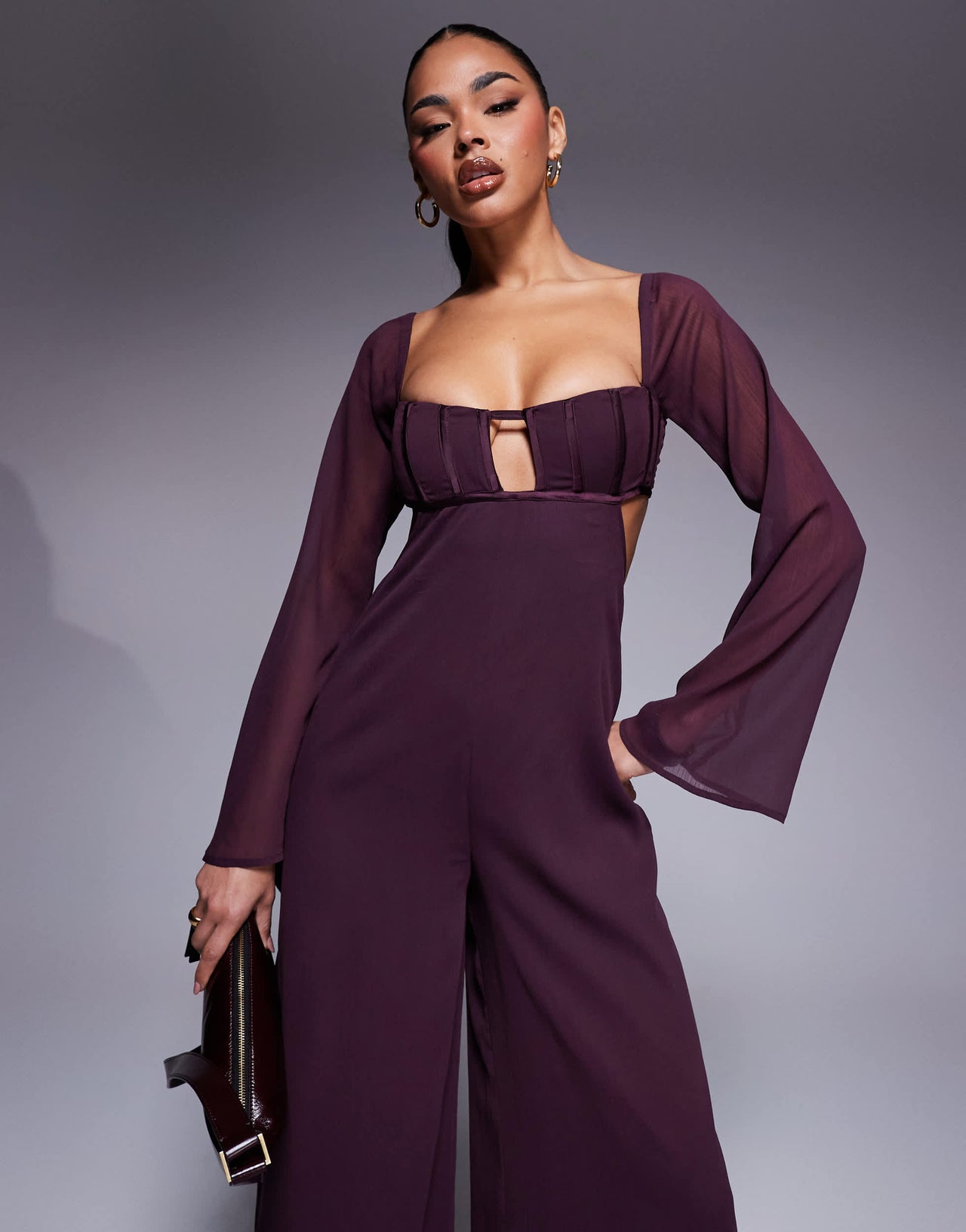 ASOS DESIGN satin corset bust wide leg jumpsuit with cut out in berry