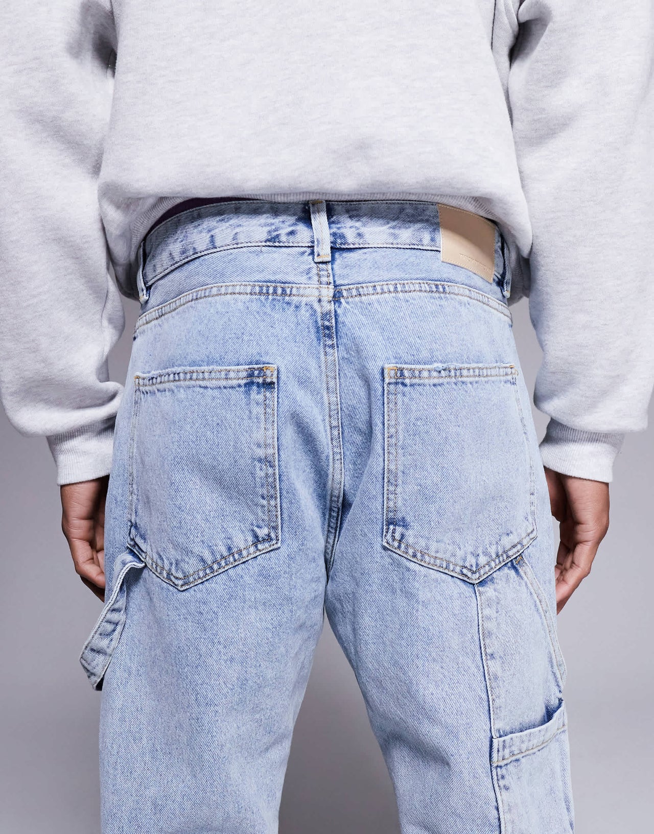 The Couture Club carpenter rivet detail jeans in blue wash